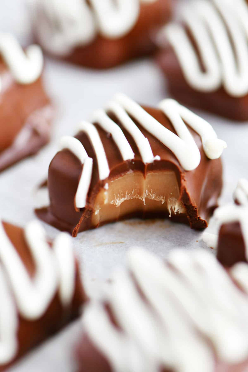 chocolate covered caramel with bite out of it