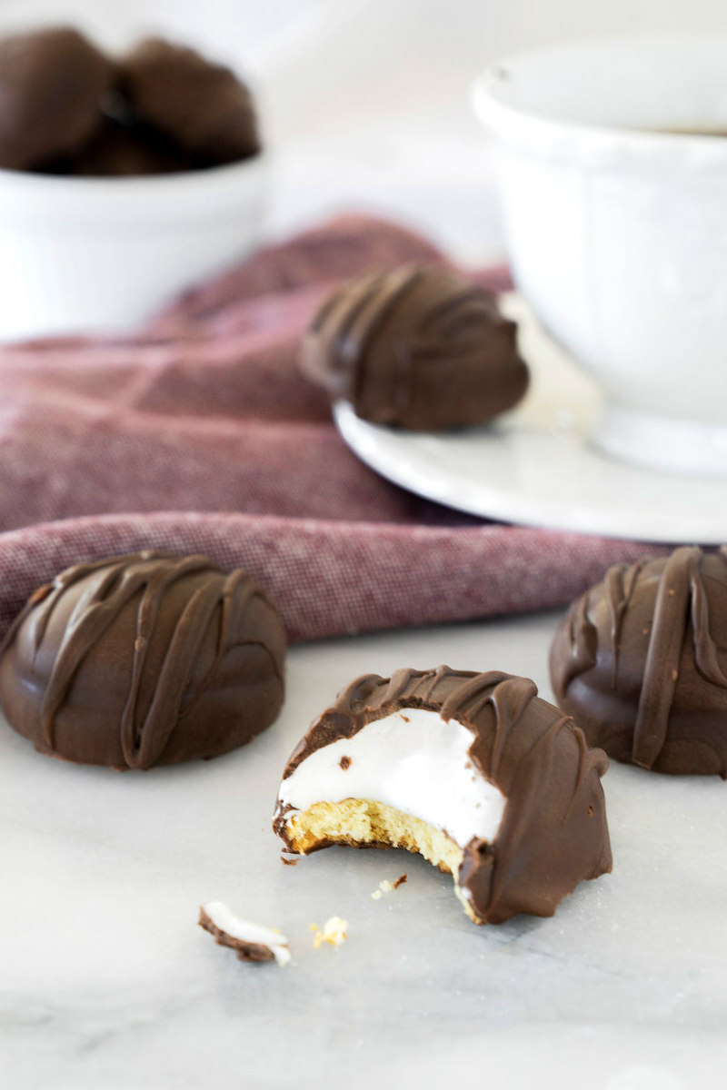 Chocolate Covered Marshmallow Cookies - one with a bite taken out of it