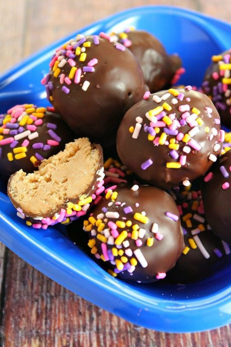 Chocolate Covered Peanut Butter balls in a blue bowl