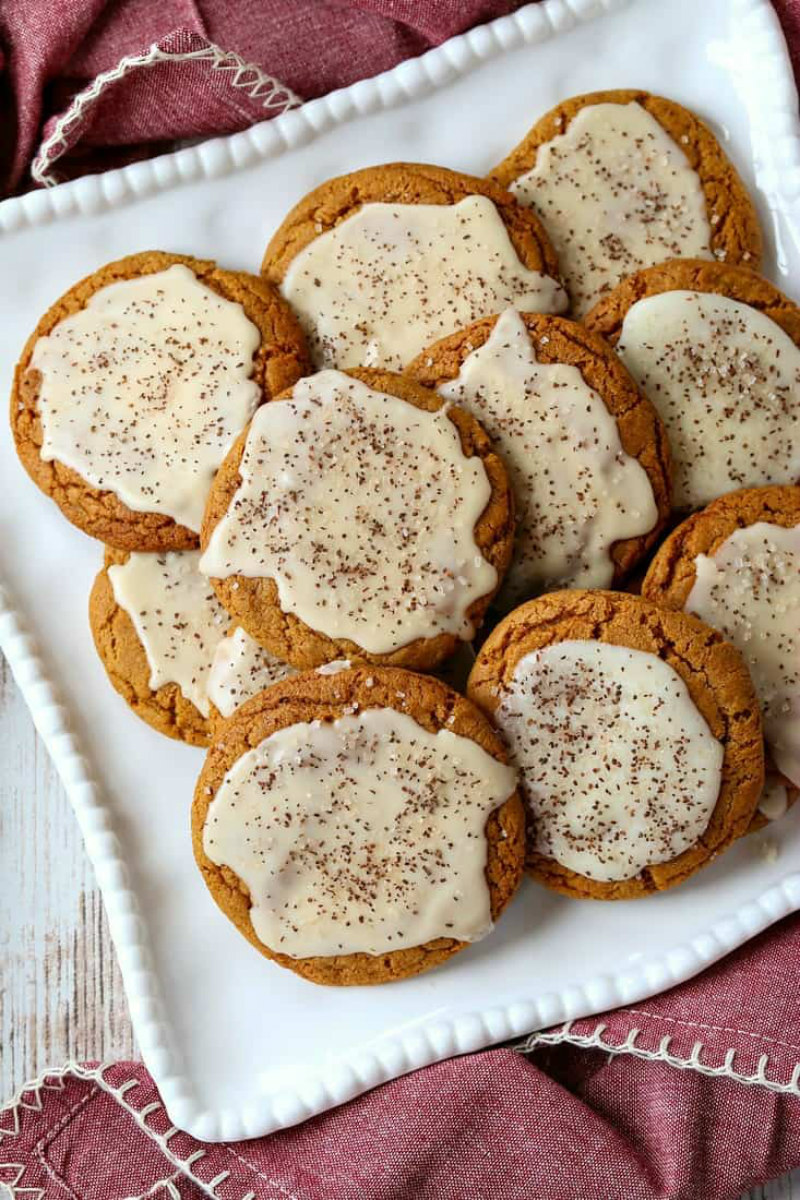 bourbon iced molasses cookies on a white platter