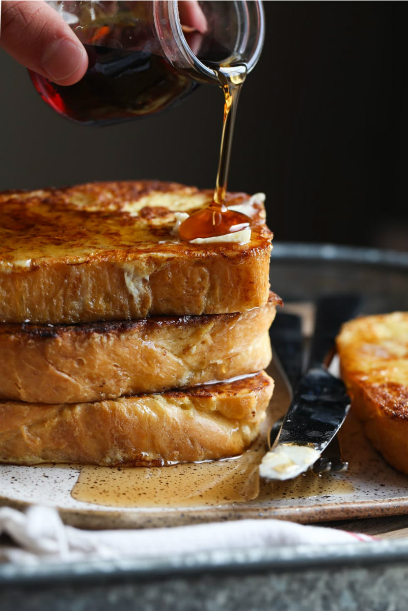 stack of brioche french toast with syrup