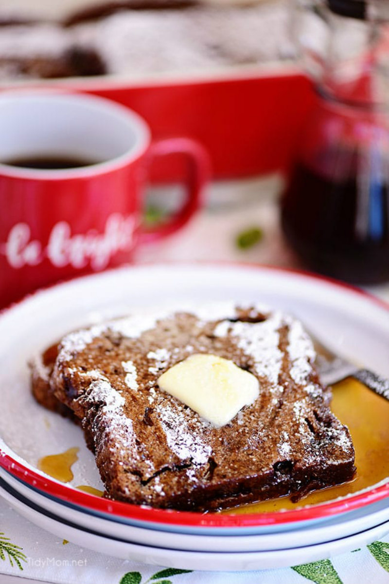 gingerbread french toast on plate with butter and syrup