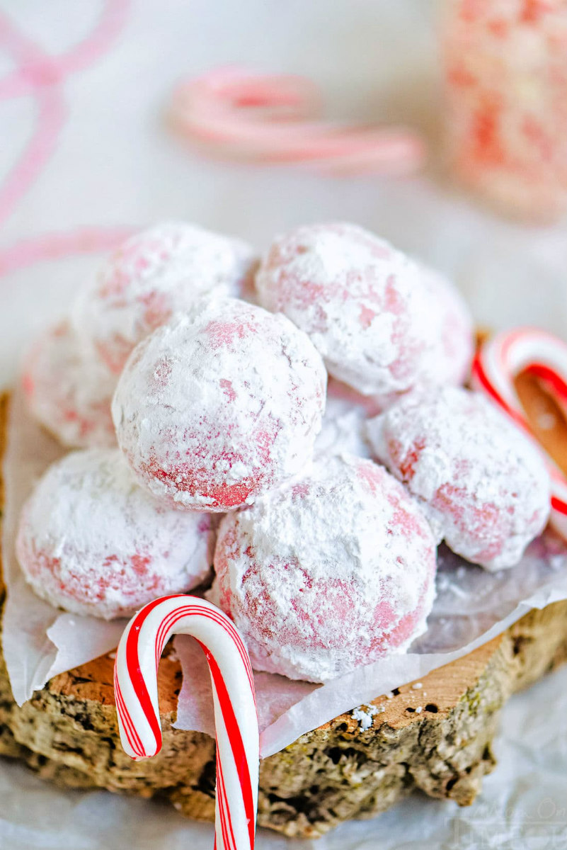 peppermint snowball cookies with candy canes