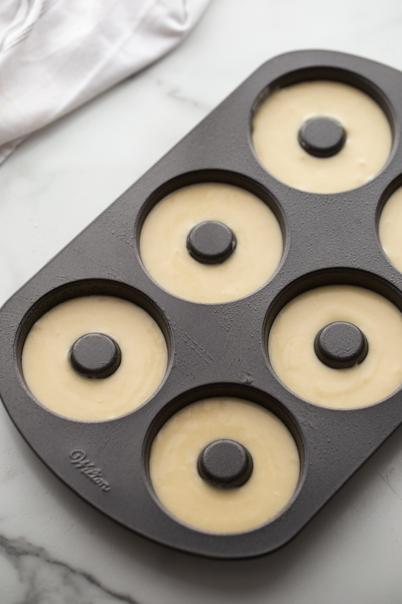 batter in pan for doughnuts ready for oven