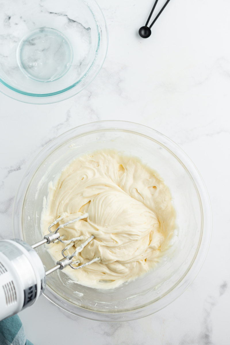 cream cheese frosting in a bowl