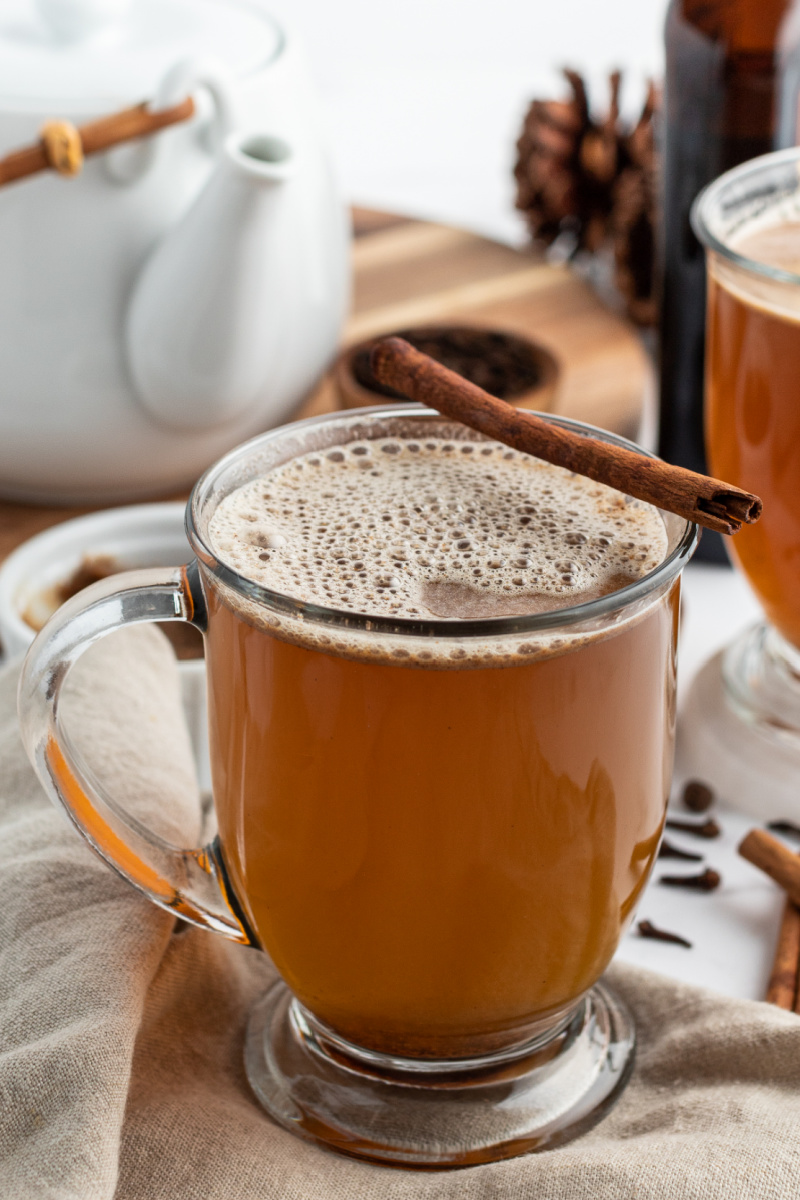 hot buttered rum garnished with cinnamon stick