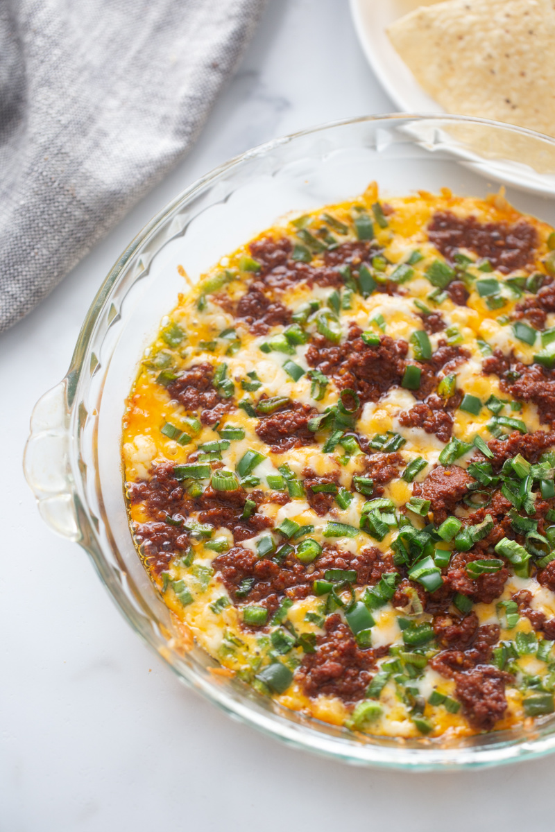Queso Fundido baked in a glass dish