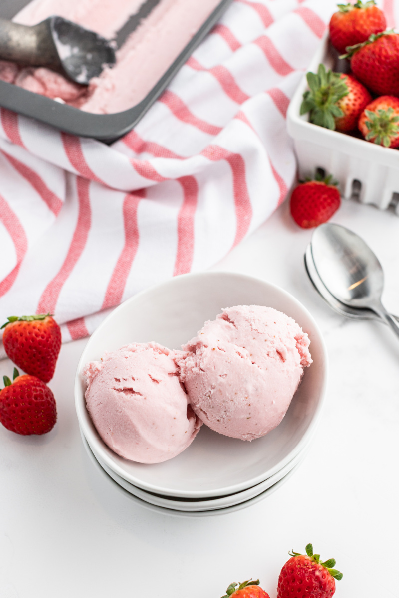 strawberry ice cream scoops in a dish