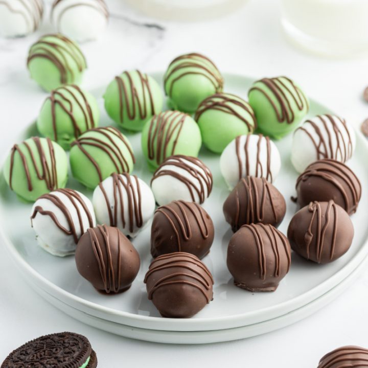 chocolate mint oreo truffles on a white plate