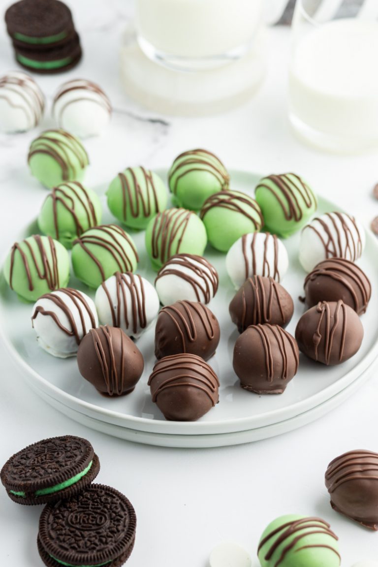 chocolate mint oreo truffles on a white plate