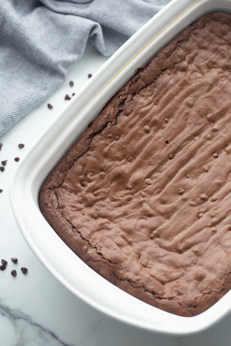 baked brownies in a white pan