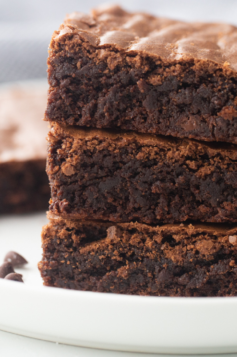 best fudgy brownies in a stack of three