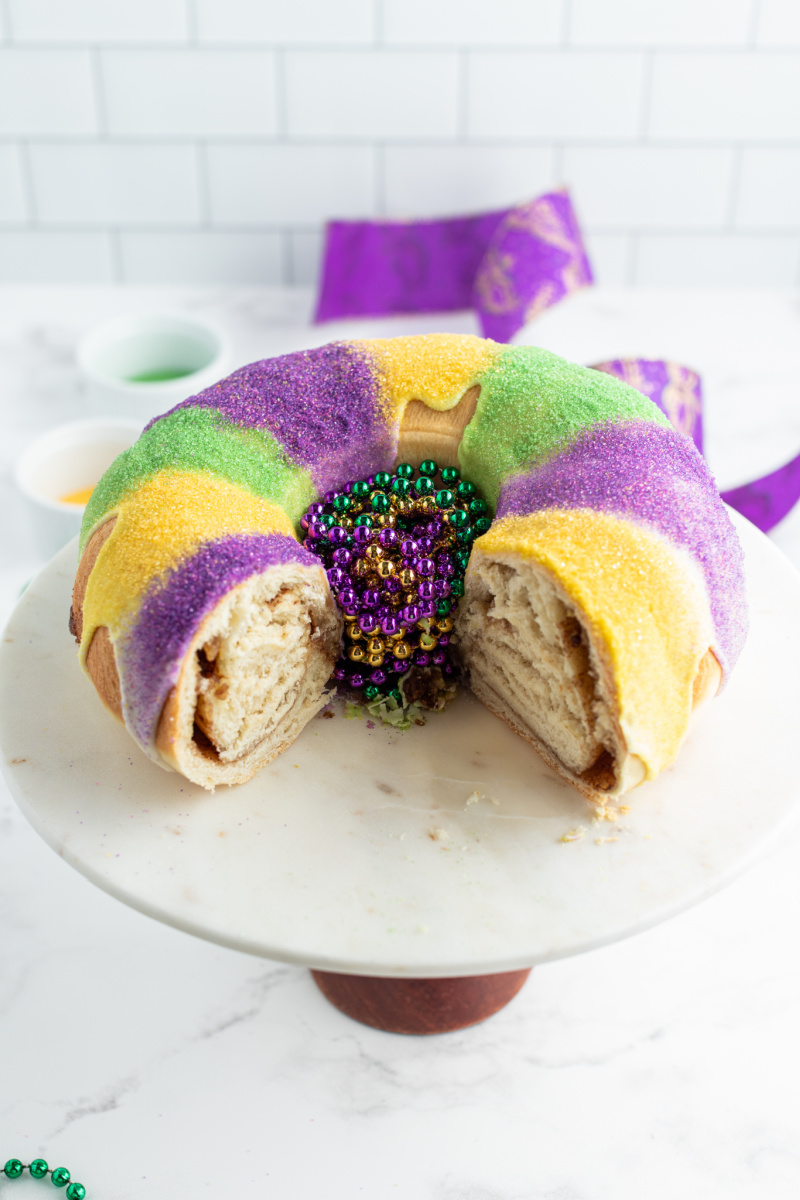 king cake with big slice cut out of it