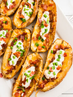 potato skins filled with cheese, sour cream and bacon