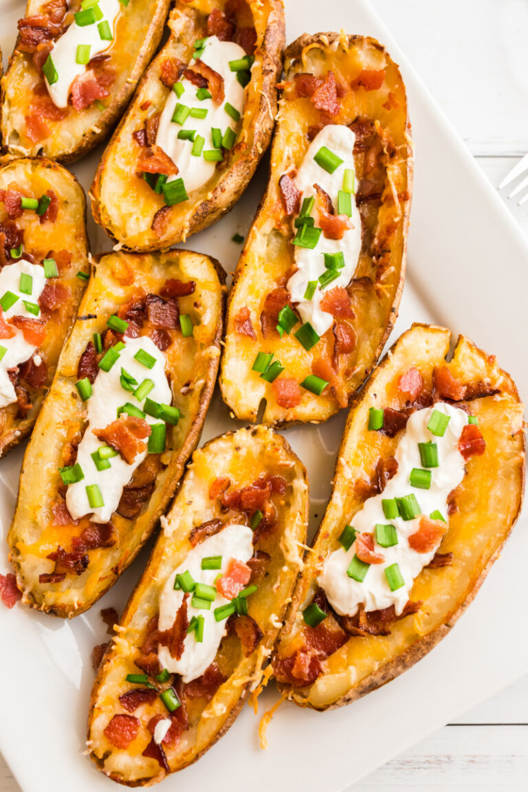 potato skins filled with cheese, sour cream and bacon