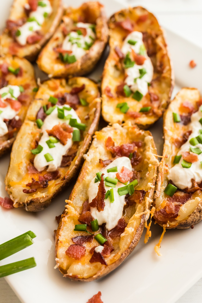 potato skins filled with cheese, sour cream and bacon