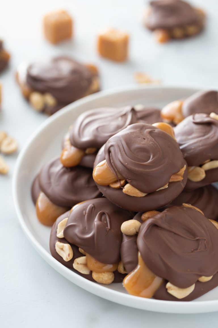 caramel peanut clusters on a serving platter