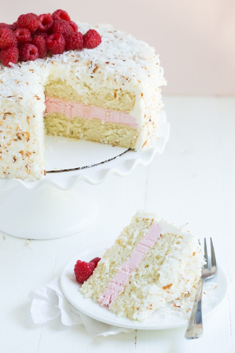 coconut cake and cake slice on plate