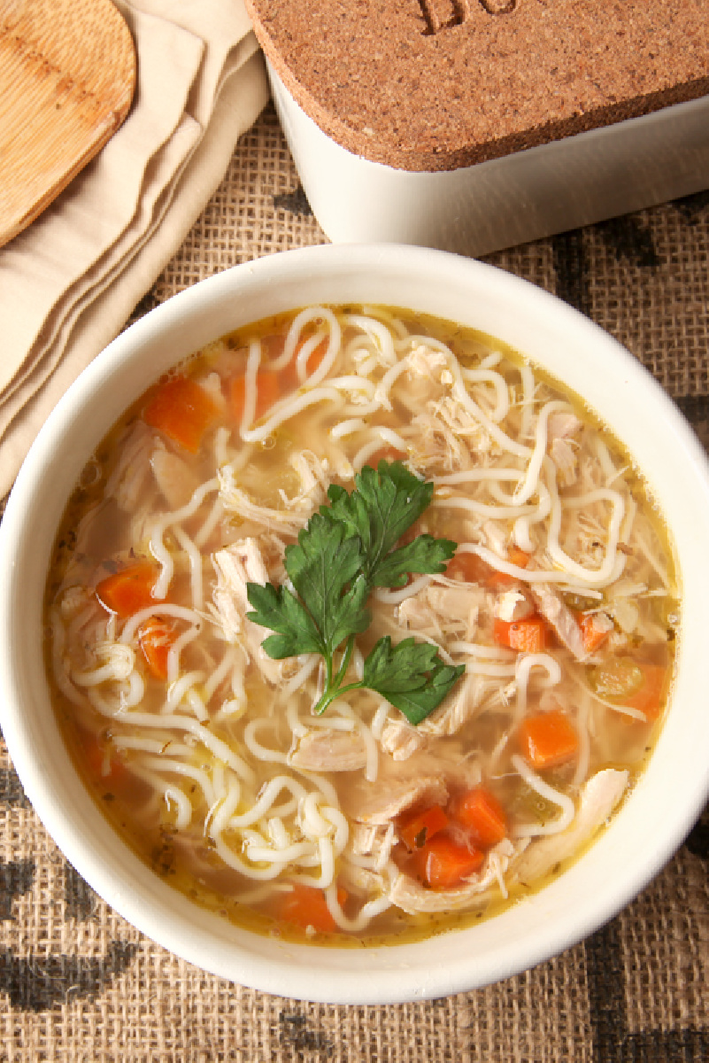 Low Carb Chicken Noodle Soup in a white bowl