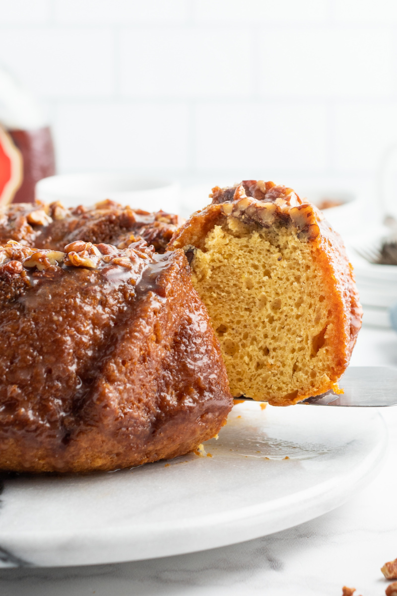 taking a slice out of bundt cake