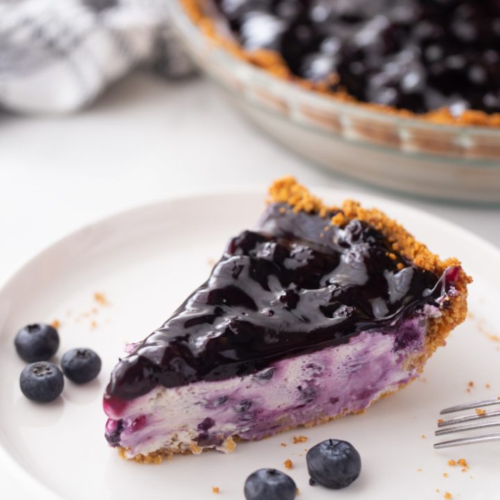 slice of blueberry cheesecake pie