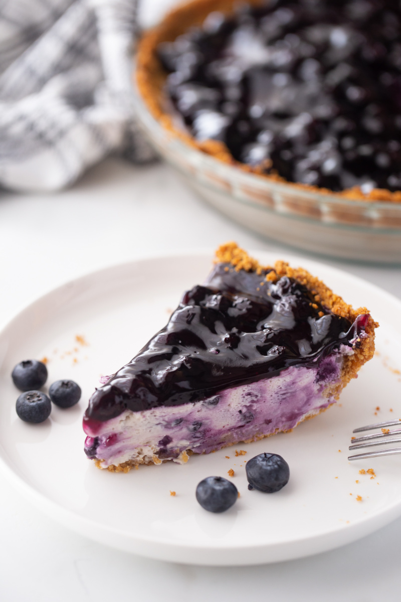 slice of blueberry cheesecake pie