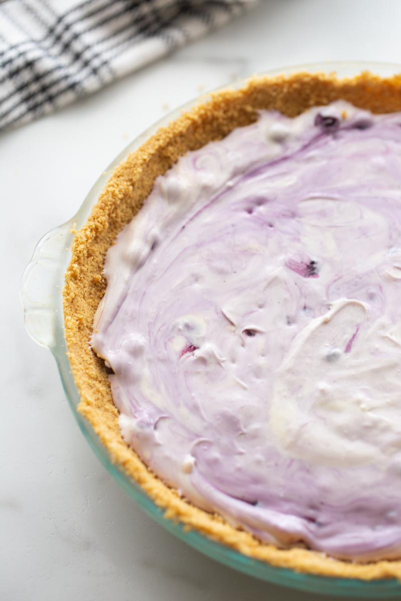 blueberry cheesecake pie in graham cracker crust