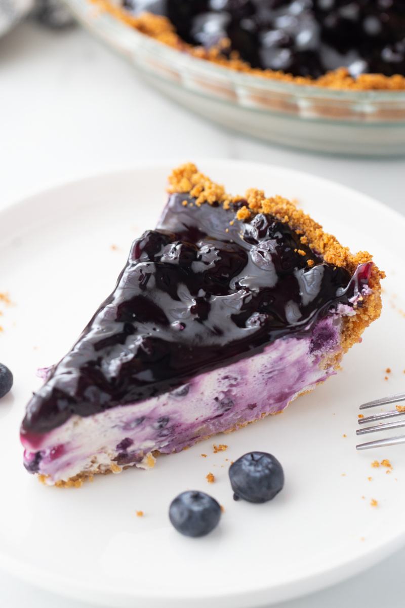 slice of blueberry cheesecake pie
