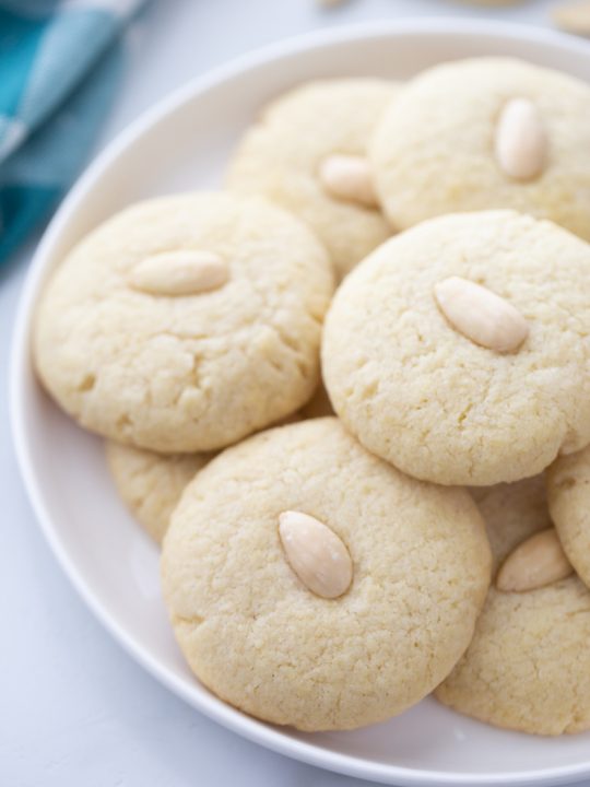 chinese almond cookies on a white plate