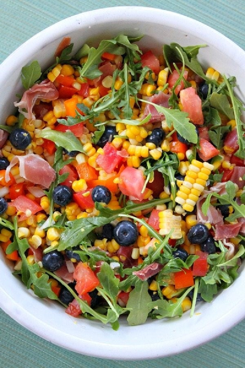 blueberry corn salad in white bowl