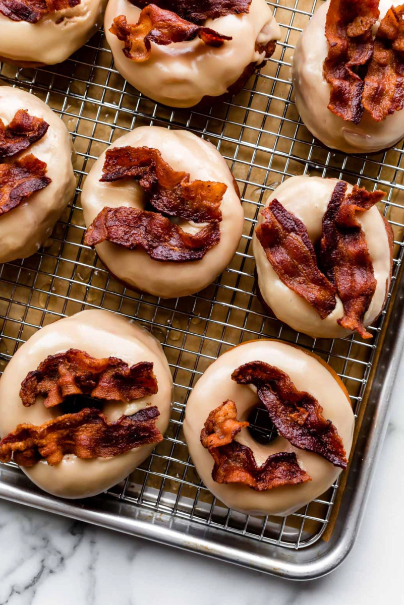 maple bacon doughnuts on a cooling rack