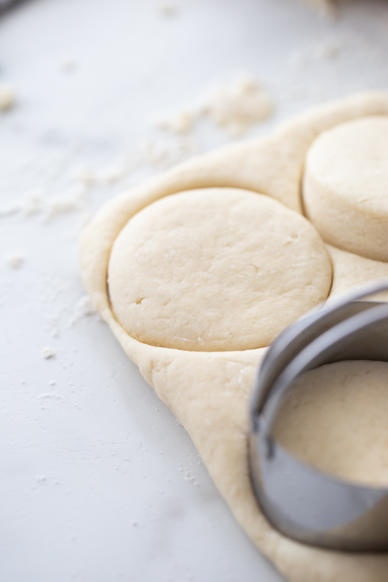 biscuits punching out of biscuit dough