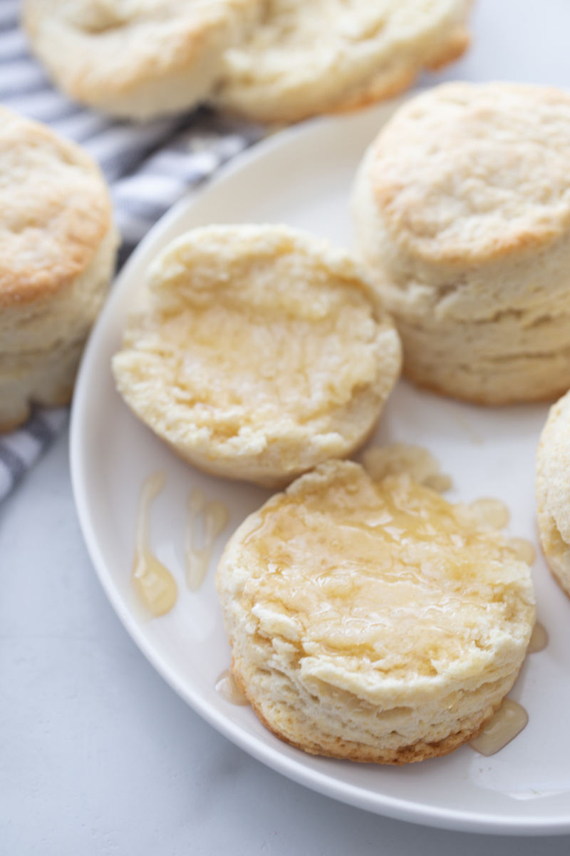 biscuits cut in half with butter