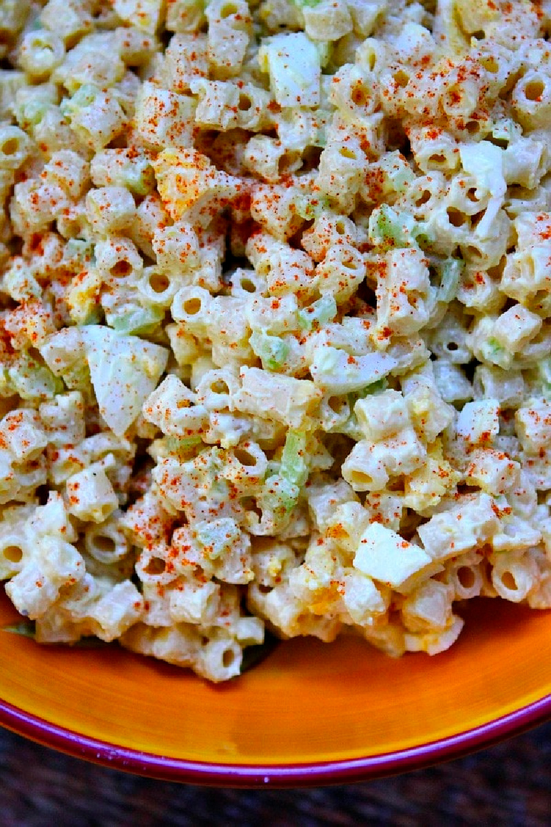 old fashioned macaroni salad in orange bowl