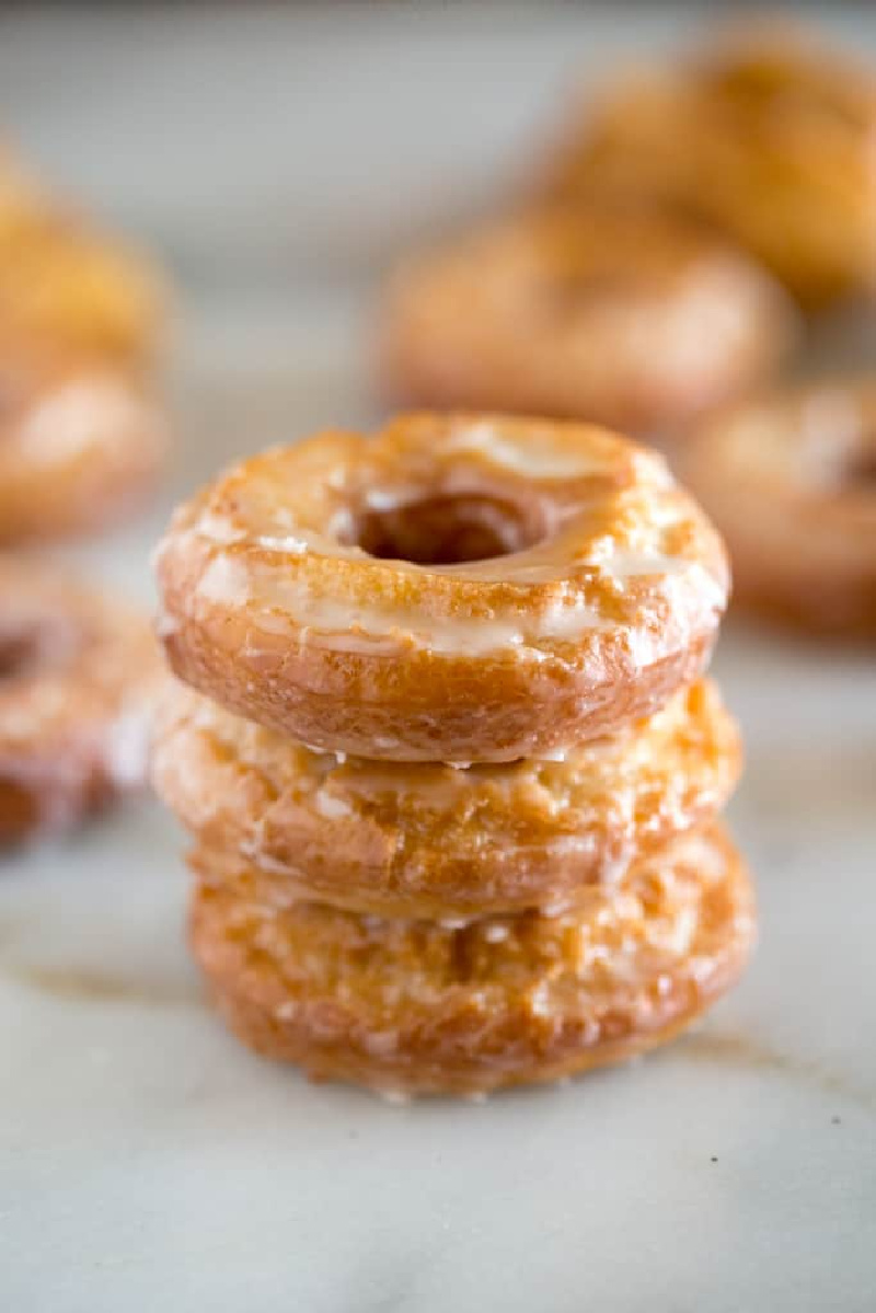stack of three old fashioned sour cream doughnuts