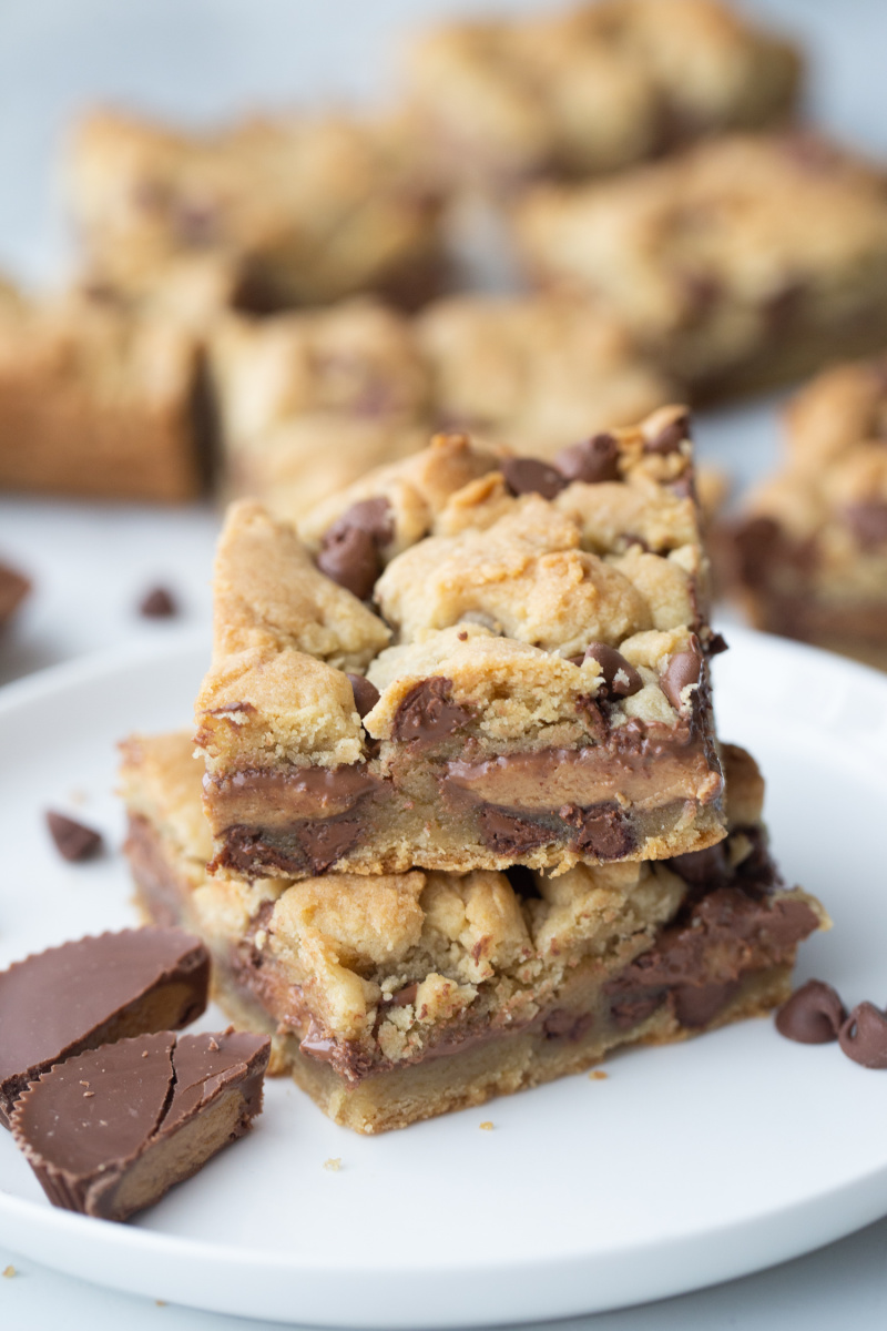 two reeses stuffed chocolate chip cookie bars stacked