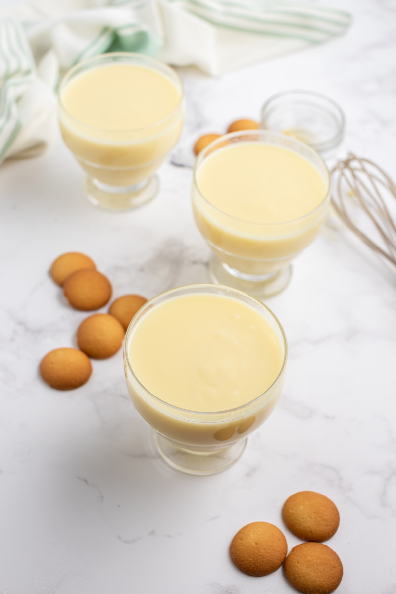 vanilla pudding in 3 glass dishes