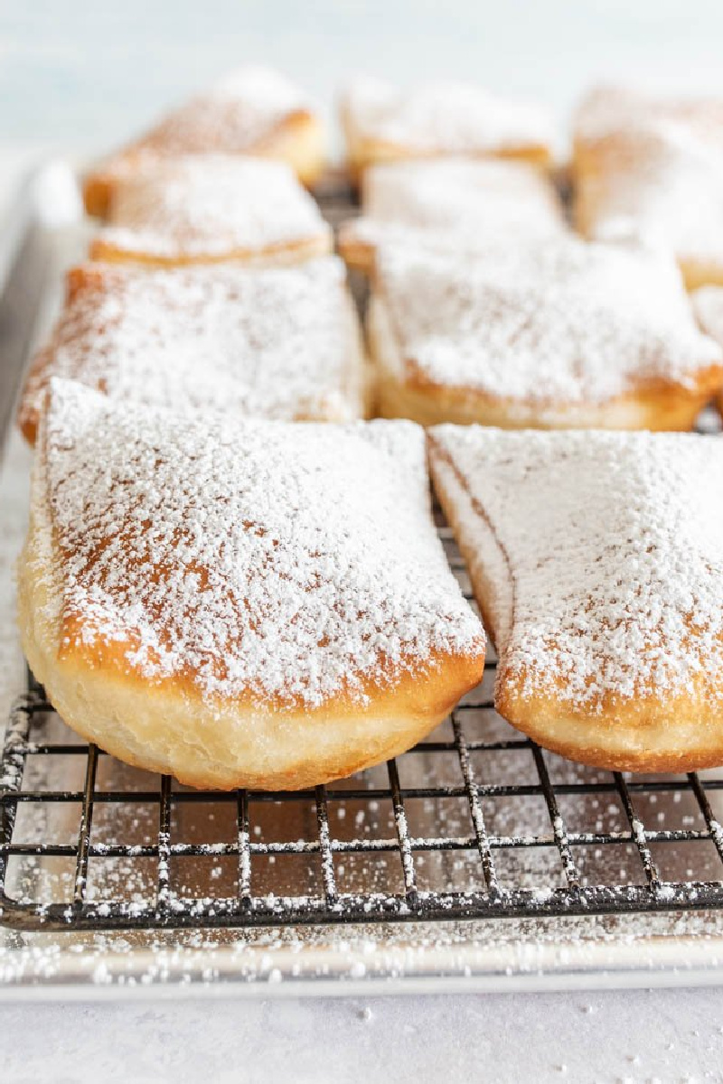 beignets on a cooling rack