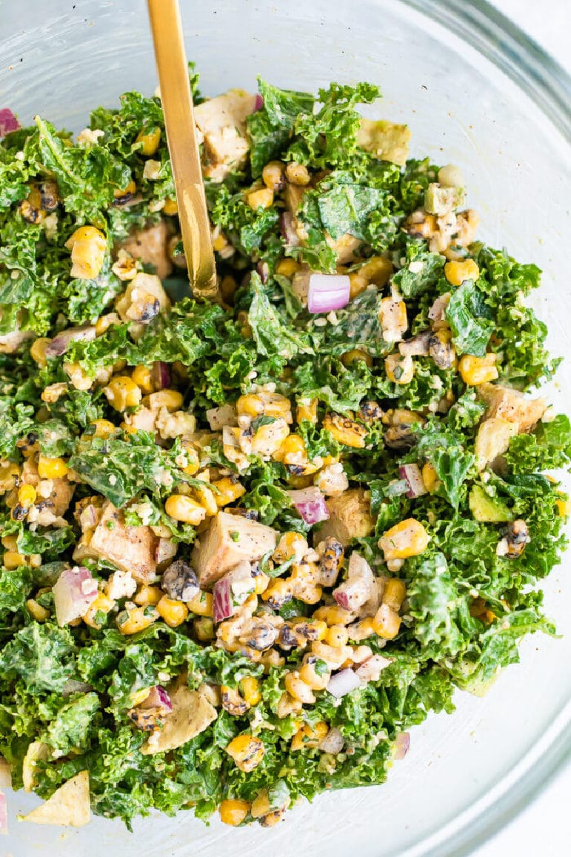 kale mexican street corn salad in white bowl