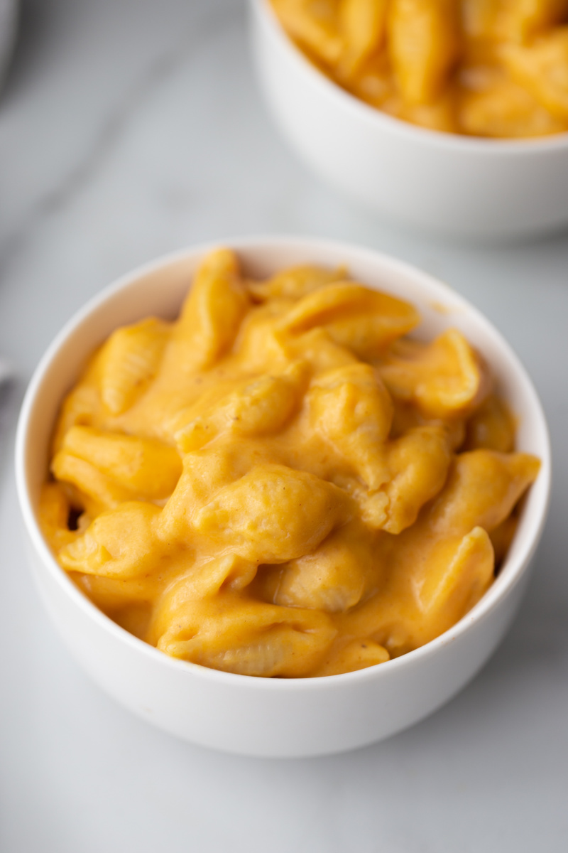 macaroni and cheese in a white bowl