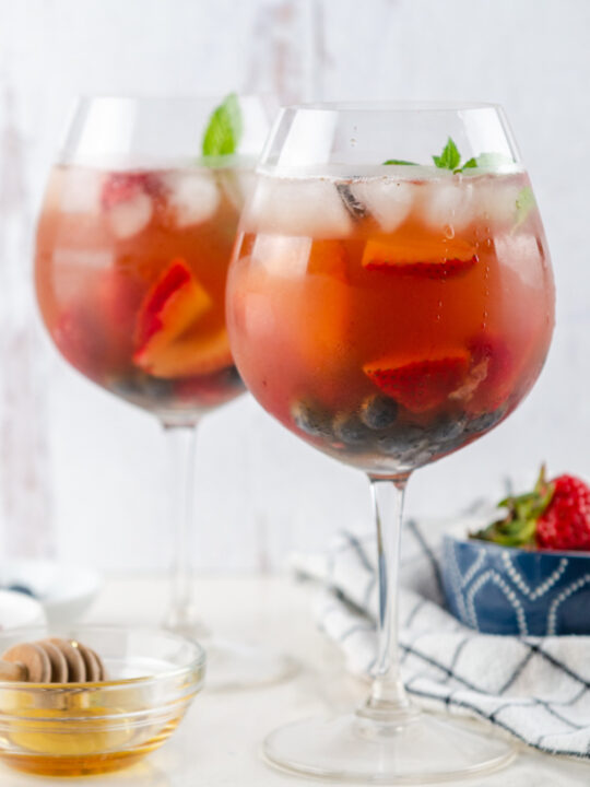 two glasses of berry iced tea sangria
