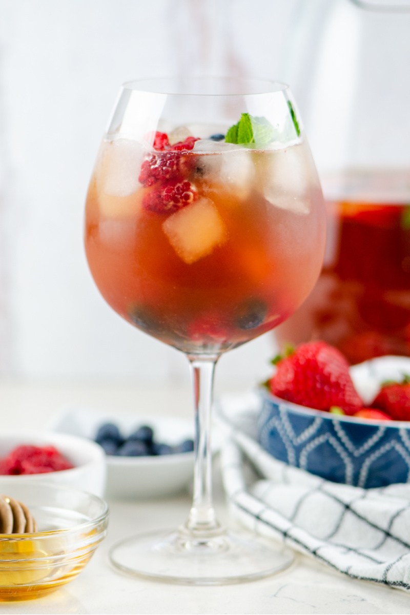 glass of berry iced tea sangria