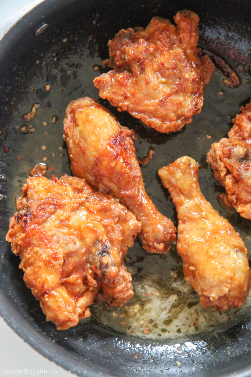 honey butter fried chicken in the pan