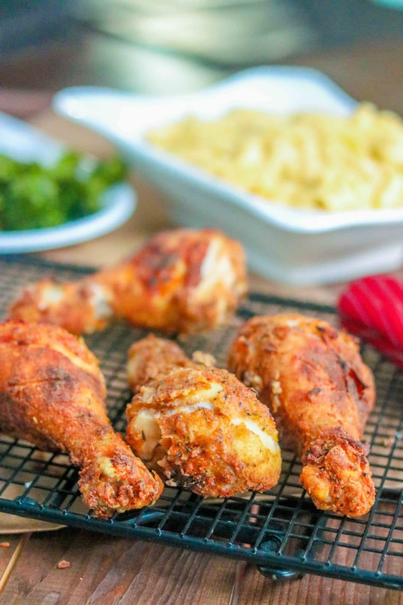 oven fried chicken on a cooling rack