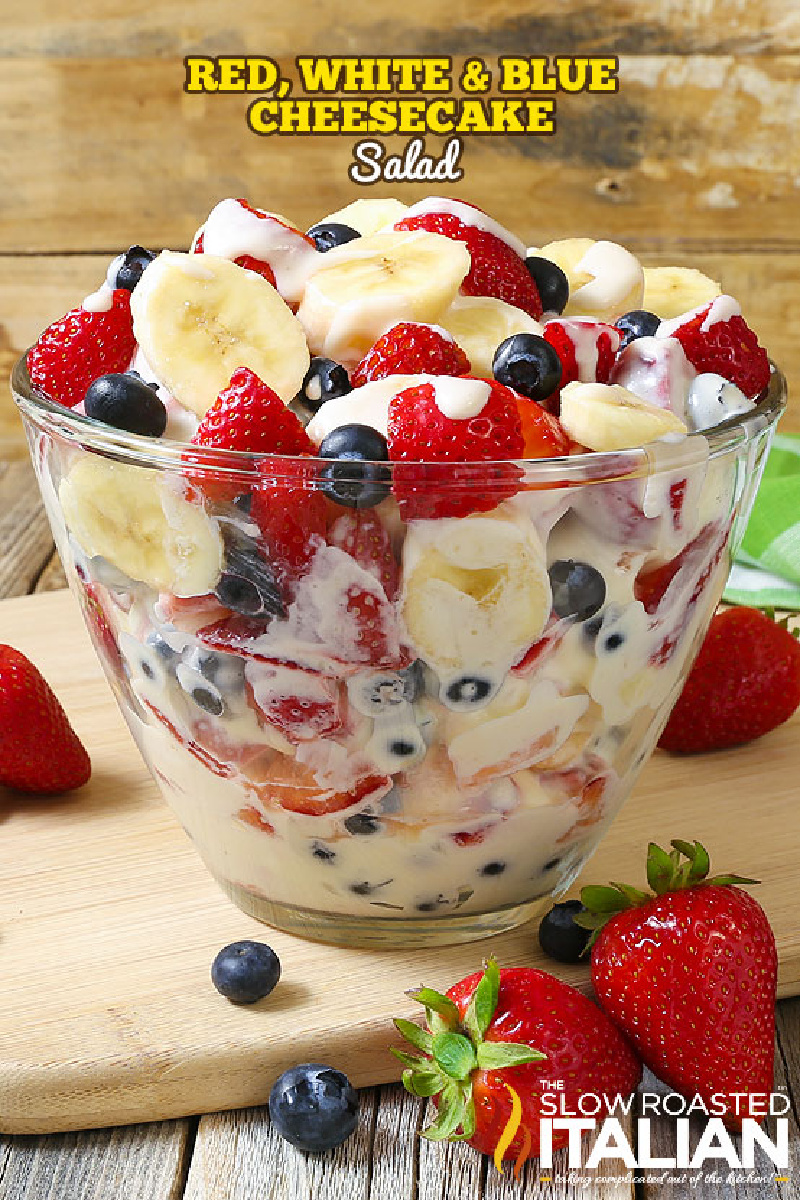 glass bowl of red white and blue cheesecake salad