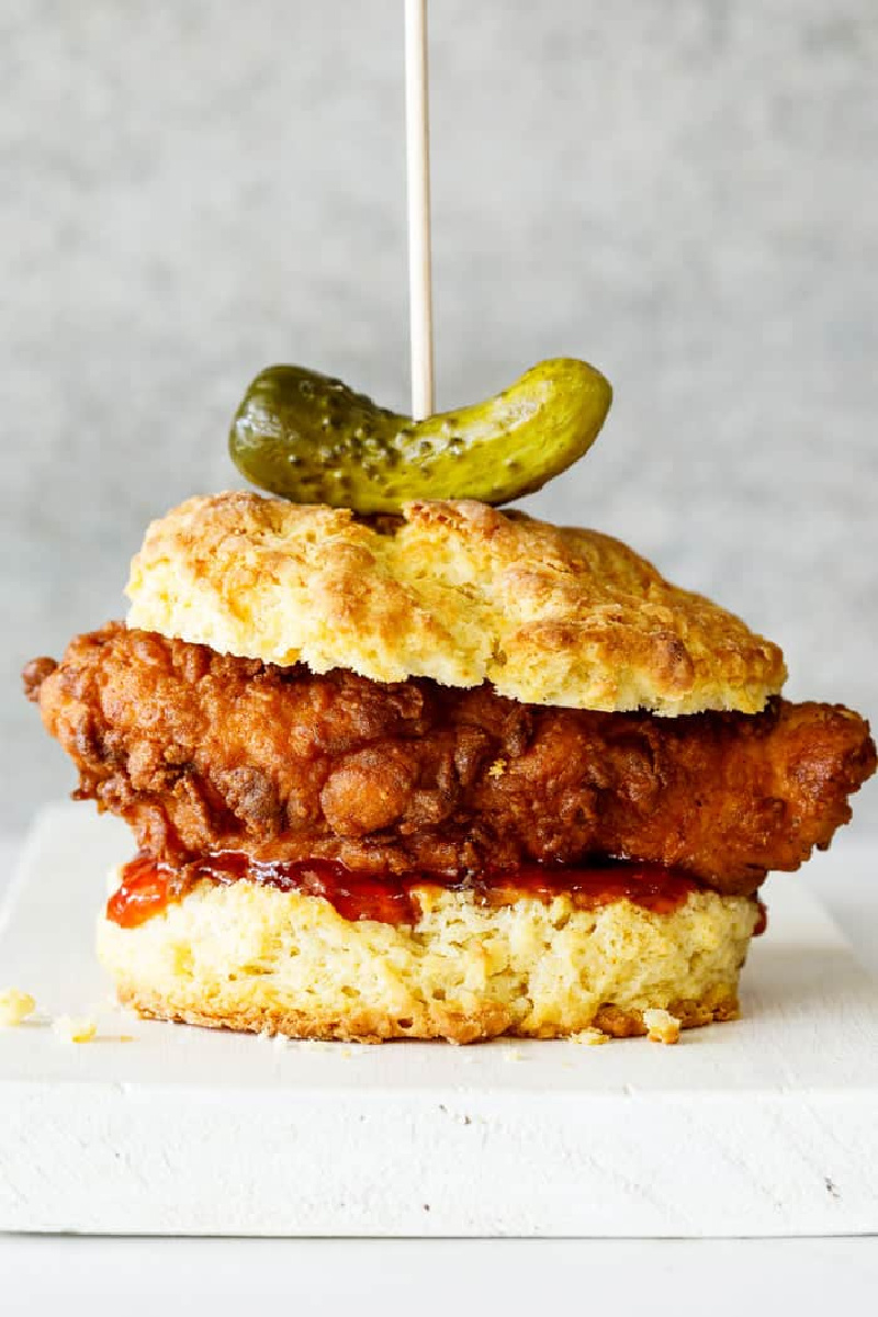 southern fried chicken biscuit sandwich with a pickle