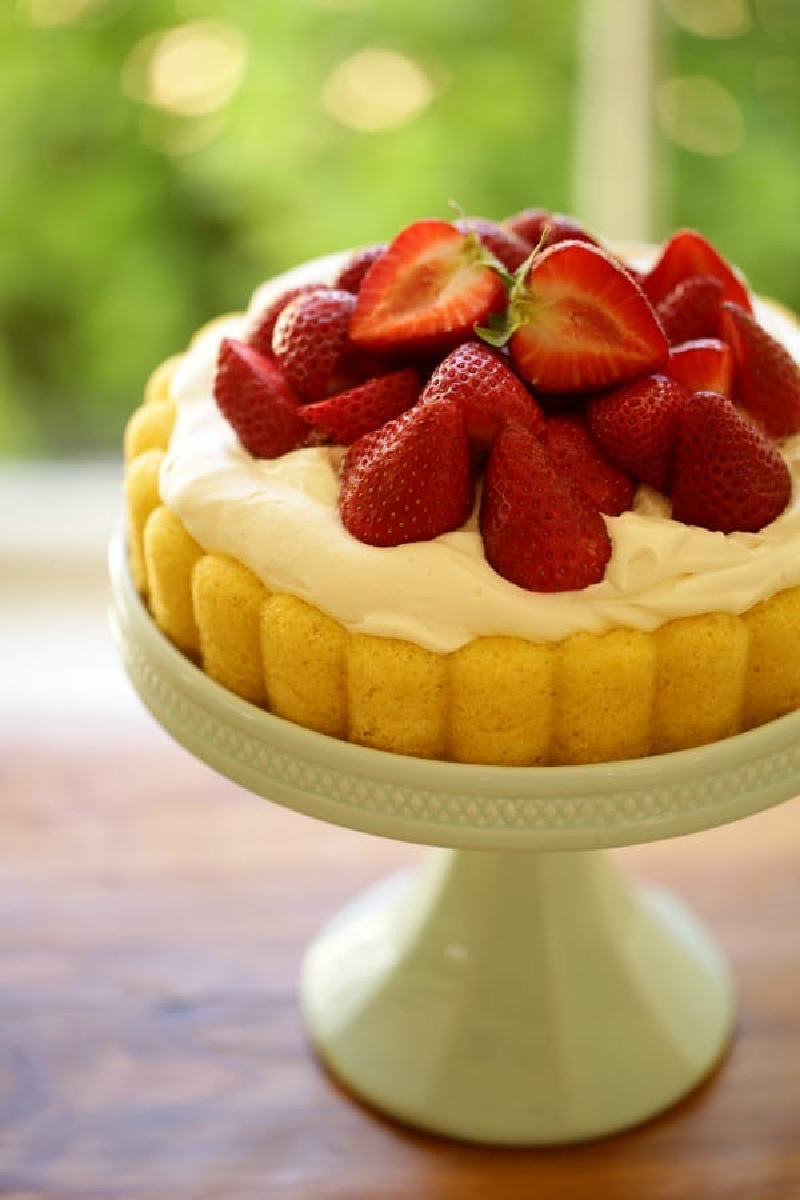 strawberry shortcake charlotte on a cake platter