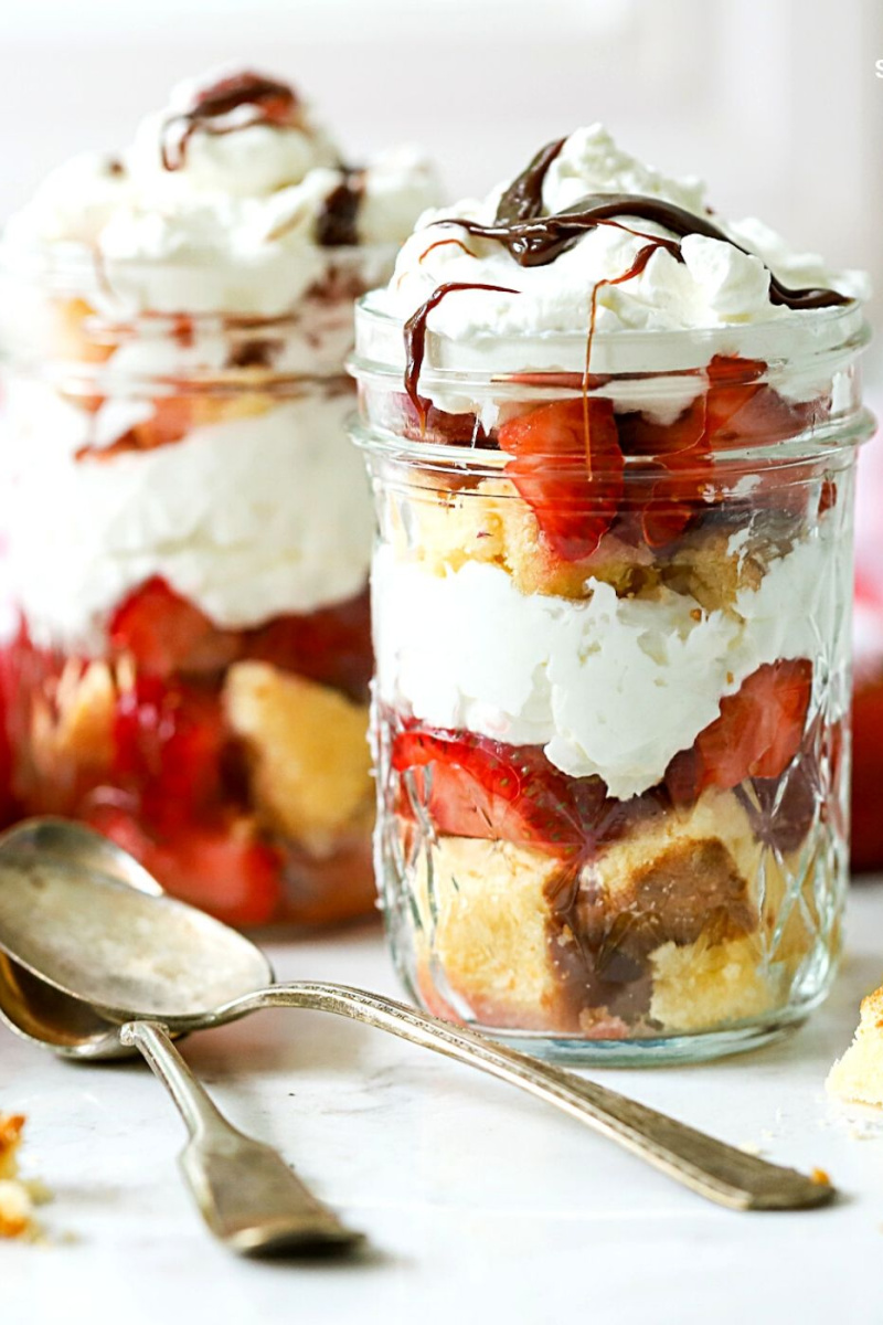 two strawberry shortcakes in a jar