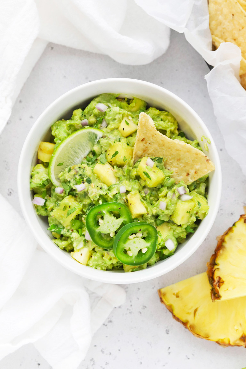 pineapple guacamole in a white bowl