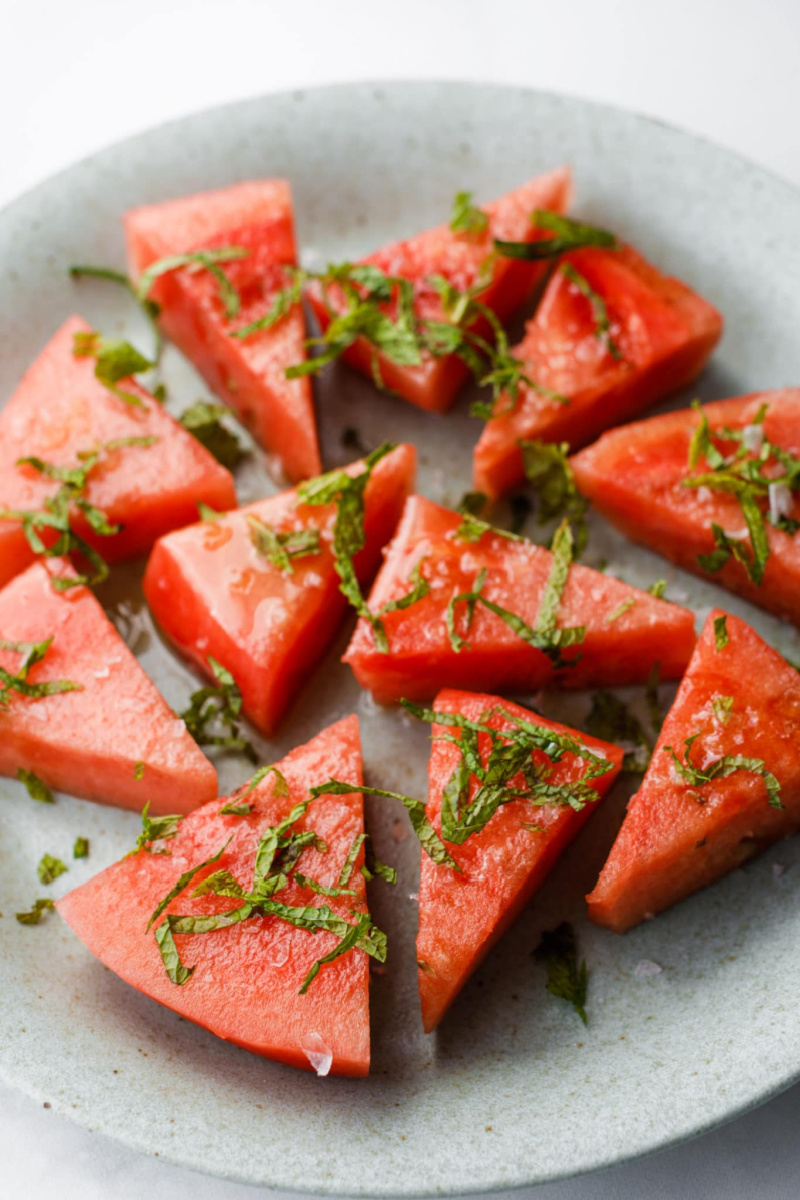 slices of salted watermelon on a plate